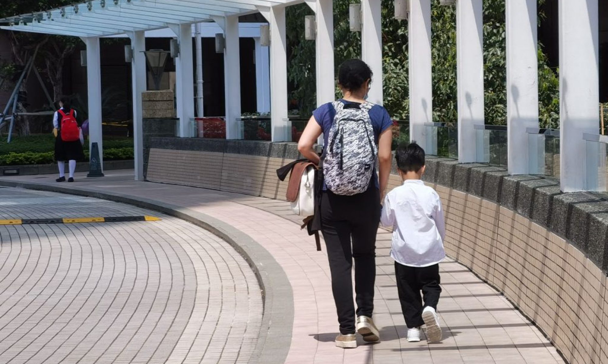 Hong Kong’s domestic helpers demand higher wages