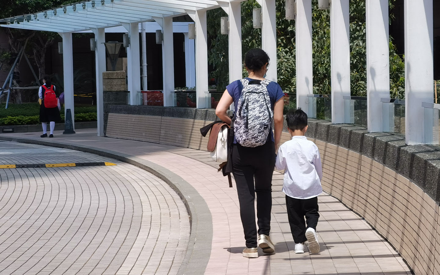 Hong Kong’s domestic helpers demand higher wages