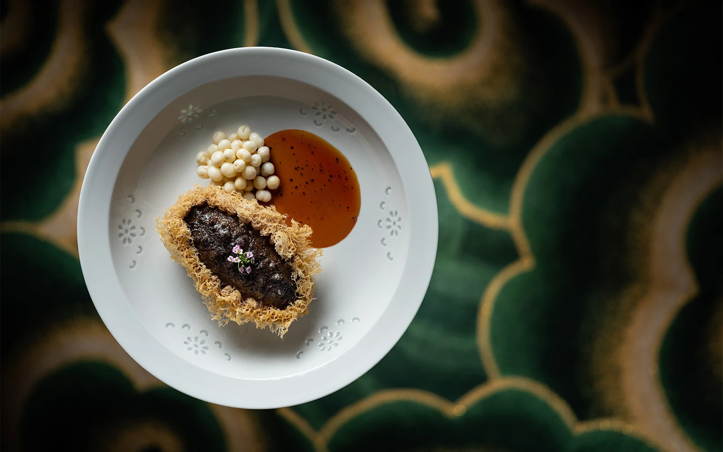 Inside Lakeview Palace’s new menu at Wynn Palace - Kanto sea cucumber filled with goose and shrimp, wrapped with deep-fried taro purée, Zhu's reworking of a classic Nanjing dish that he added in Cantonese element and spent more than half a year perfecting