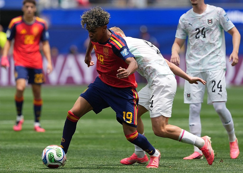 Lamine Yamal drives at the Austria defence during Spain's World Cup round of 32 clash in Los Angeles