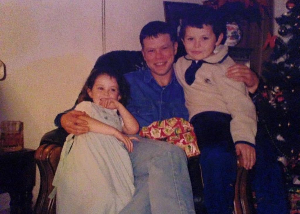 A young Derry Ainsworth with his father and sister