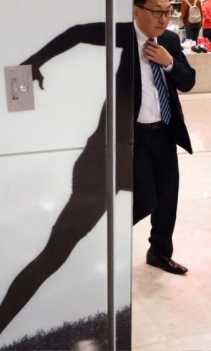 Man In a Hurry: Meet Hong Kong street photographer Edas Wong