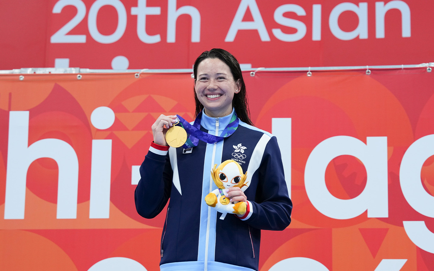 Asian Games update: Haughey and China’s swimmers shine - Siobhan Haughey poses with her gold medal after winning the women's 200m freestyle at the Asian Games in Tokyo