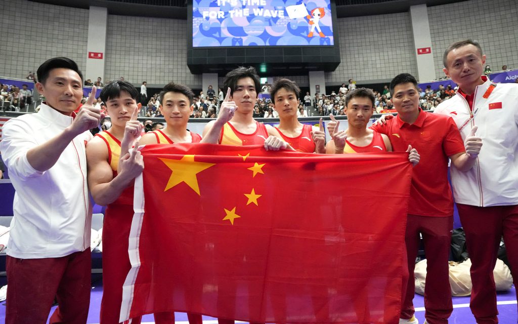 Asian Games update: China, Hong Kong and Macao shine - Team China celebrates after winning the men's team final in artistic gymnastics at the Asian Games in Nagoya