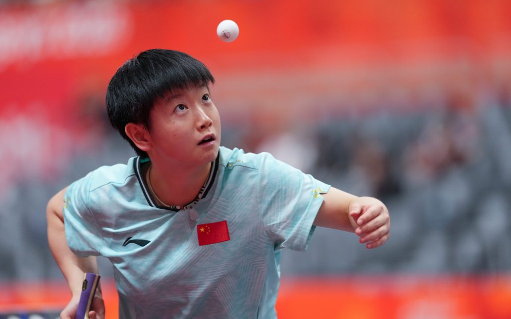 Sun Yingsha serves to Hayata Hina during the women's team table tennis final between China and Japan in Toyota, Aichi Prefecture