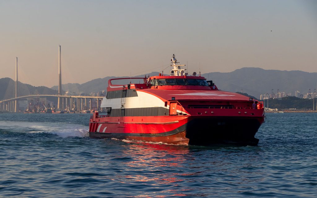A TurboJET ferry near Hong Kong's Stonecutters Bridge, with the operator also running sailings from Macao to Shenzhen