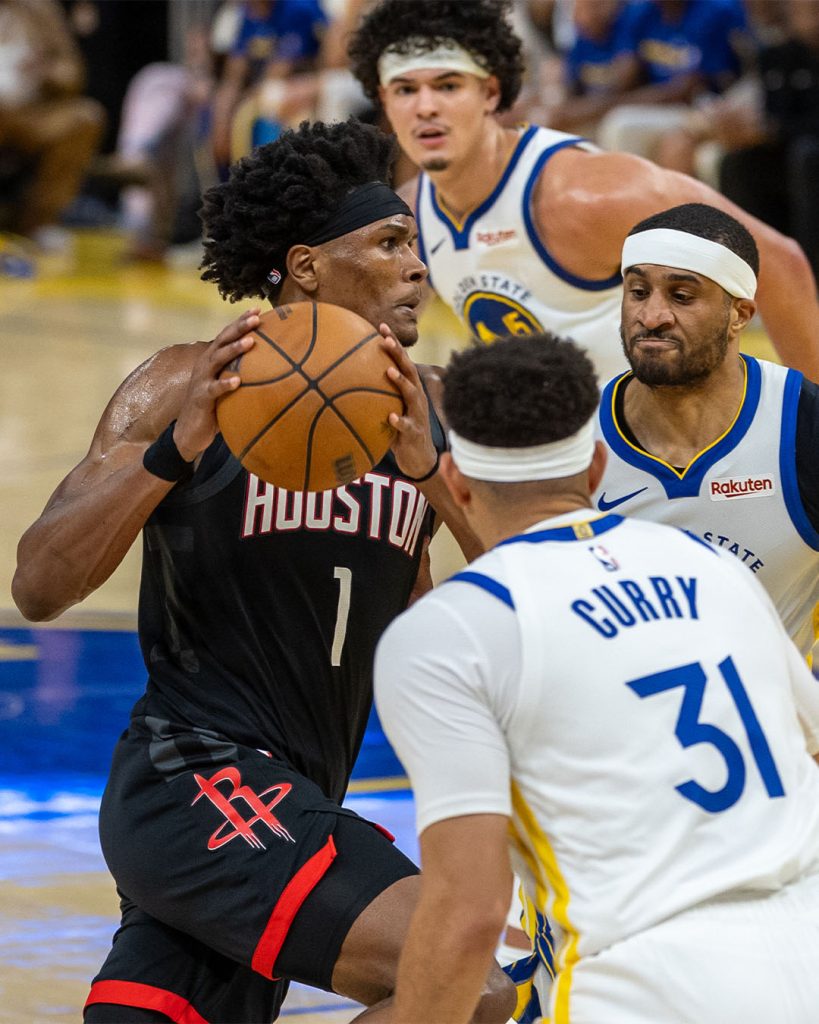 Amen Thompson (left) breaks through against the Golden State Warriors in San Francisco on 5 April