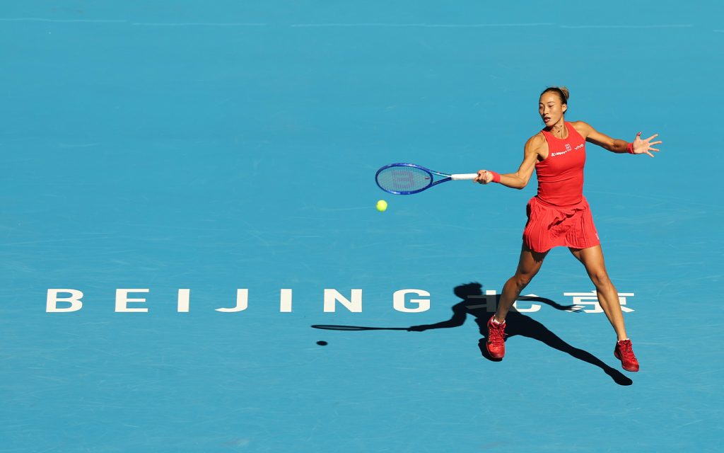 Zheng Qinwen in action against fellow Chinese player Shi Han in the first round of the China Open in Beijing on 1 October