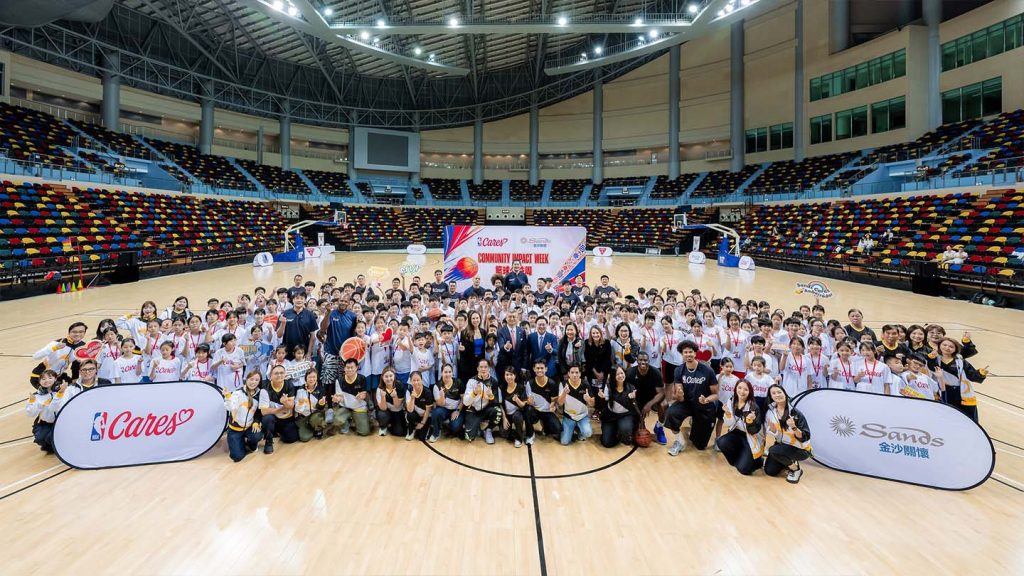 Participants gather for a group photo during NBA Cares x Sands Cares Community Impact Week at the Macao East Asian Games Dome